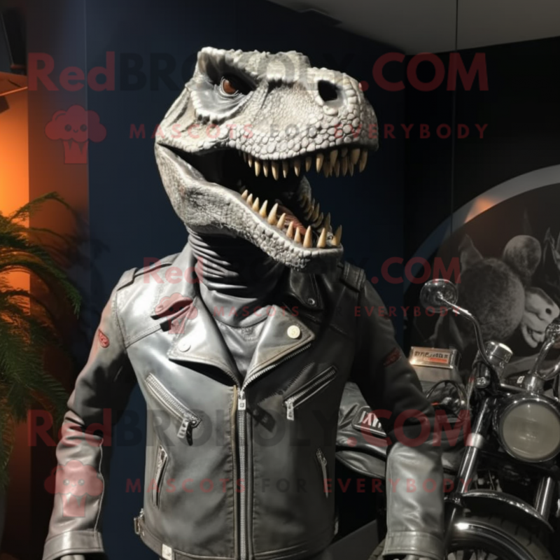 Silver Allosaurus mascot costume character dressed with a Moto Jacket and Belts Silver Allosaurus mascot costume character dressed with a Moto Jacket and Belts