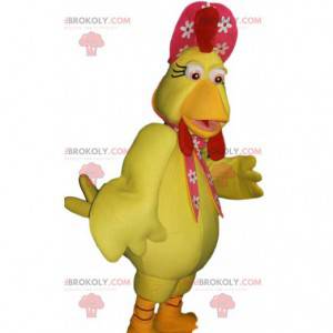 Mascote de galinha amarela e chapéu vermelho com flores -
