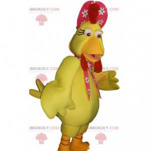 Mascotte de poule jaune et son chapeau rouge à fleurs -