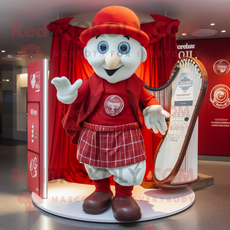 Red Celtic Harp mascot costume character dressed with a Oxford Shirt and Caps Red Celtic Harp mascot costume character dressed with a Oxford Shirt and Caps