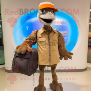 Brown Ostrich mascot costume character dressed with a Jumpsuit and Messenger bags