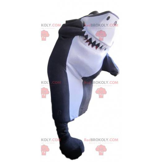 Mascota de tiburón gris y blanco demasiado divertida -