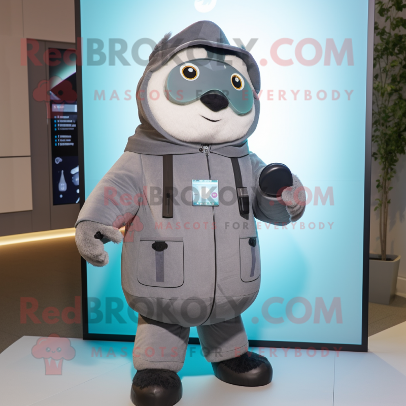 Gray But mascot costume character dressed with a Parka and Smartwatches Gray But mascot costume character dressed with a Parka and Smartwatches