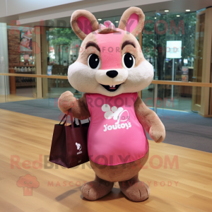Pink Squirrel mascot costume character dressed with a Shift Dress and Tote bags