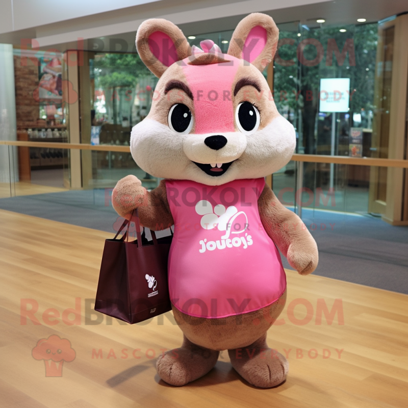 Pink Squirrel mascot costume character dressed with a Shift Dress and Tote bags Pink Squirrel mascot costume character dressed with a Shift Dress and Tote bags