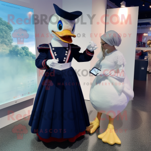 Navy Muscovy Duck mascot costume character dressed with a Ball Gown and Smartwatches