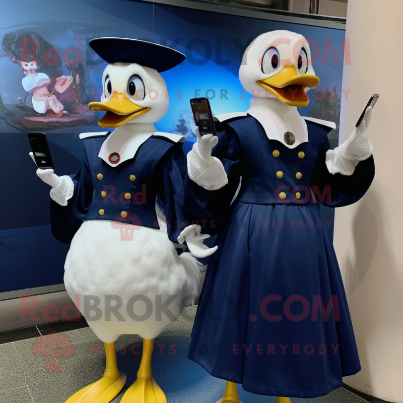 Navy Muscovy Duck mascot costume character dressed with a Ball Gown and Smartwatches