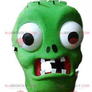 Mascot af den uhyre grønne Frankenstein og hans brune bluse -