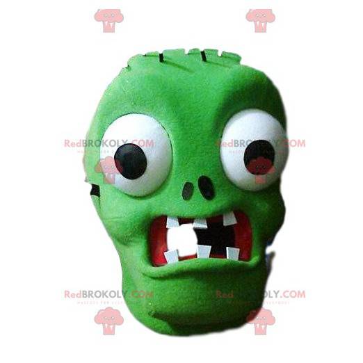 Mascot af den uhyre grønne Frankenstein og hans brune bluse -