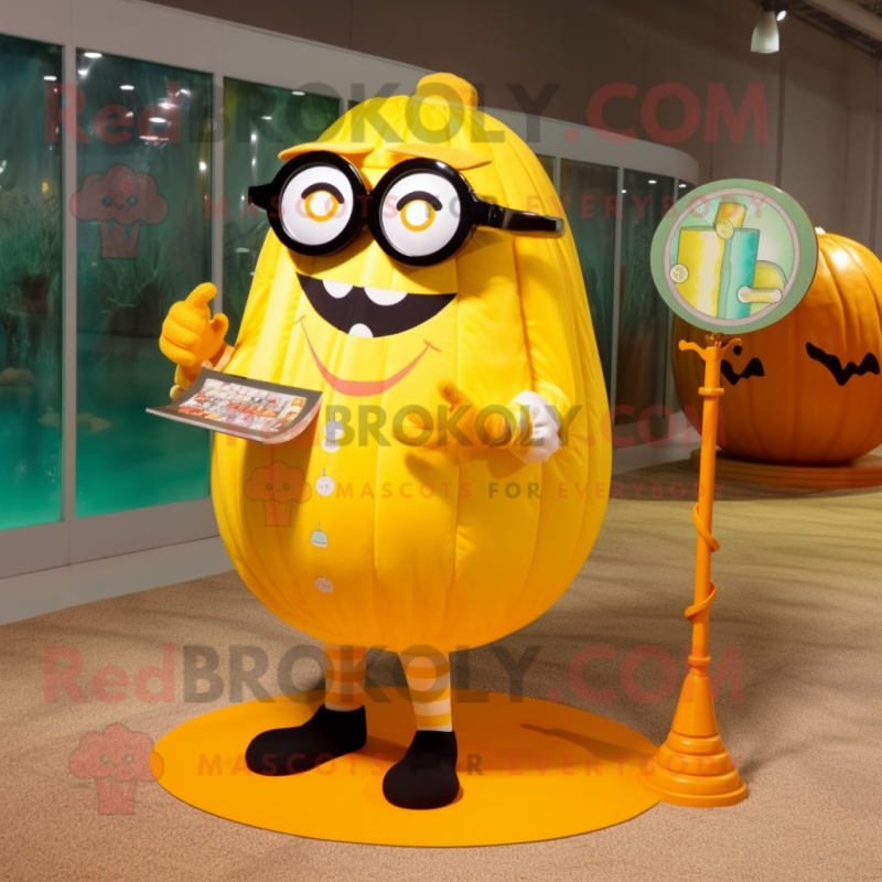 Yellow Pumpkin mascot costume character dressed with a Swimwear and Reading glasses