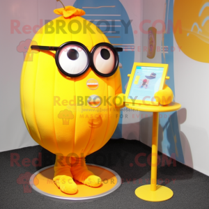 Yellow Pumpkin mascot costume character dressed with a Swimwear and Reading glasses