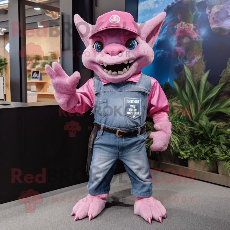 Pink Gargoyle mascot costume character dressed with a Denim Shorts and Hat pins Pink Gargoyle mascot costume character dressed with a Denim Shorts and Hat pins