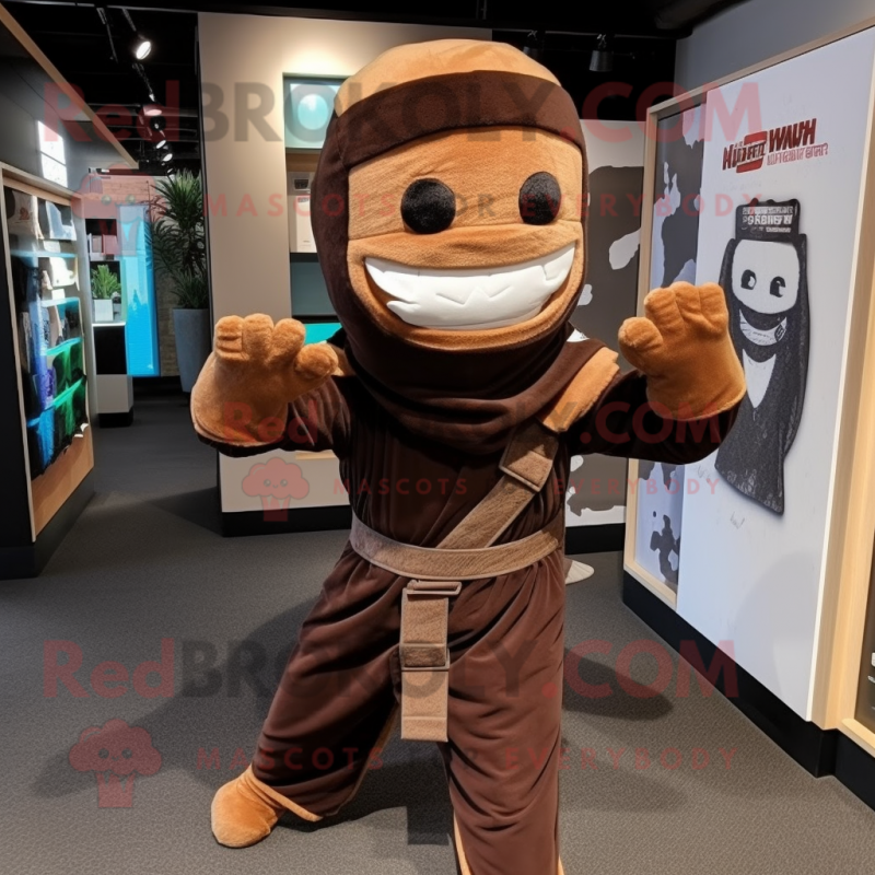 Brown Ninja mascot costume character dressed with a Playsuit and Scarves