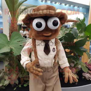 Brown Fried Calamari mascot costume character dressed with a Dress Shirt and Suspenders