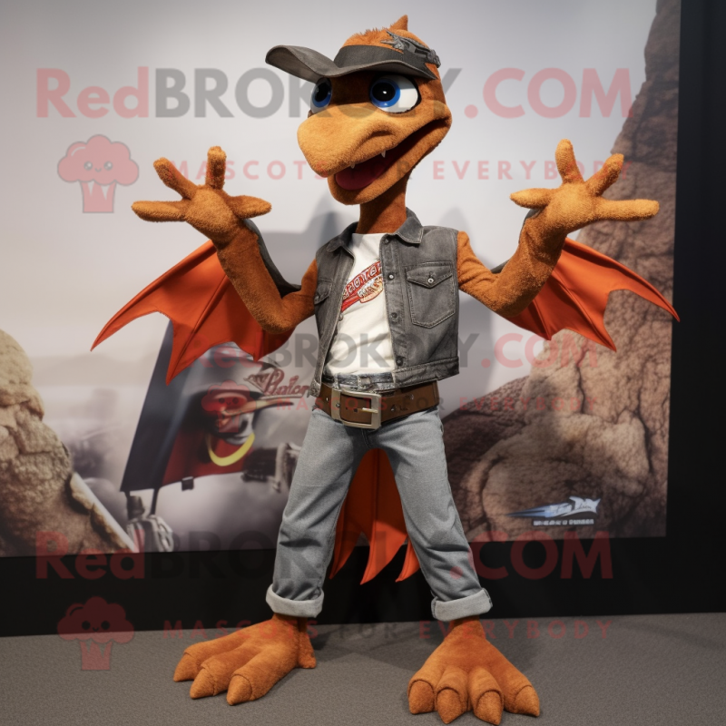 Rust Pterodactyl mascot costume character dressed with a Bootcut Jeans and Bracelets Rust Pterodactyl mascot costume character dressed with a Bootcut Jeans and Bracelets