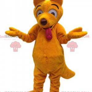 Mascota del lobo dingo amarillo y su cara divertida -
