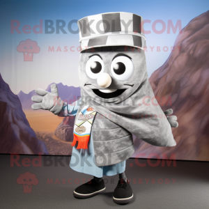 Silver Enchiladas mascot costume character dressed with a Vest and Scarves