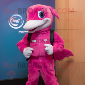 Magenta Dolphin mascot costume character dressed with a Jeans and Smartwatches