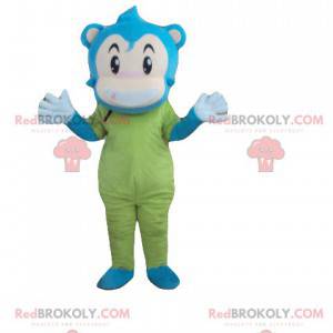 Mascotte de singe de bonhomme bleu beige et vert -