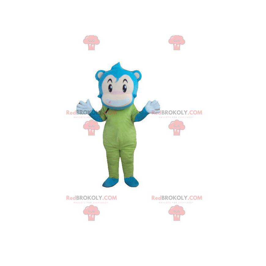 Mascotte de singe de bonhomme bleu beige et vert -