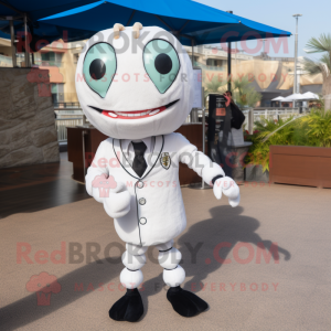 White Shrimp Scampi mascot costume character dressed with a Suit and Rings