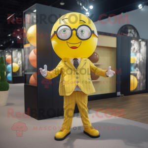 Yellow Juggle mascot costume character dressed with a Suit Jacket and Reading glasses