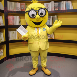 Yellow Juggle mascot costume character dressed with a Suit Jacket and Reading glasses