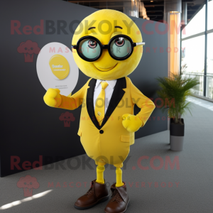 Yellow Juggle mascot costume character dressed with a Suit Jacket and Reading glasses