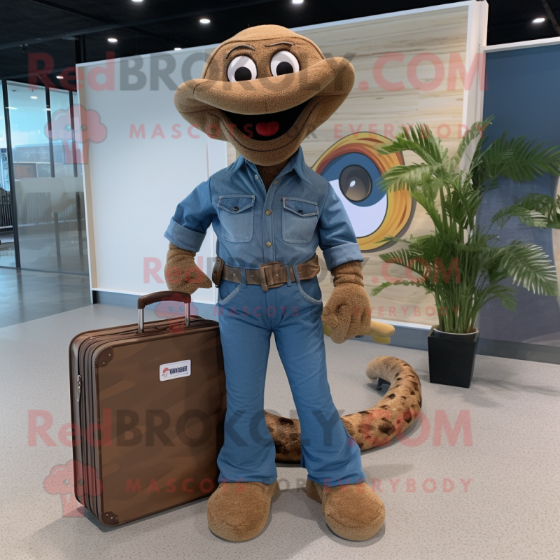 Brown Snake mascot costume character dressed with a Denim Shirt and Briefcases Brown Snake mascot costume character dressed with a Denim Shirt and Briefcases