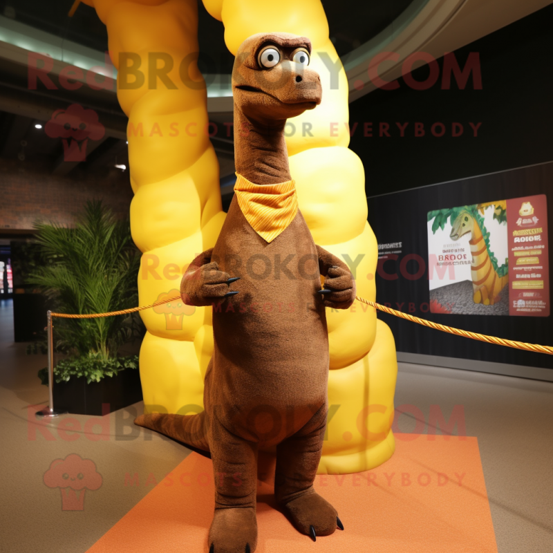 Brown Brachiosaurus mascot costume character dressed with a Cover-up and Scarf clips Brown Brachiosaurus mascot costume character dressed with a Cover-up and Scarf clips