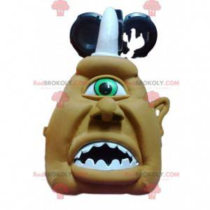 Mascotte de cyclope cruel kaki et sa corne blanche -