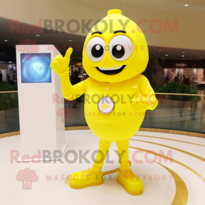 Lemon Yellow Engagement Ring mascot costume character dressed with a Long Sleeve Tee and Smartwatches