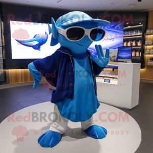 Blue Manta Ray mascot costume character dressed with a Henley Tee and Sunglasses