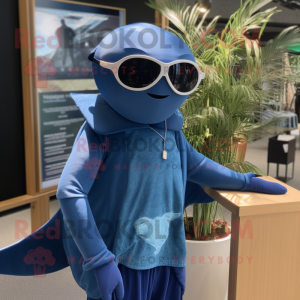 Blue Manta Ray mascot costume character dressed with a Henley Tee and Sunglasses