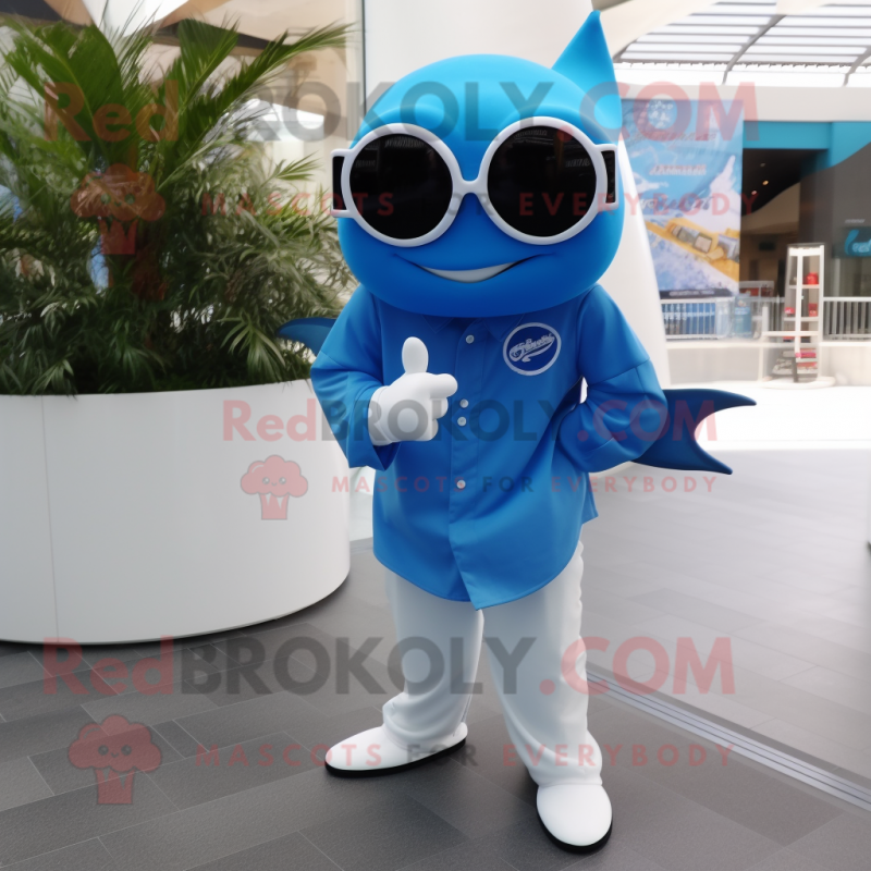 Blue Manta Ray mascot costume character dressed with a Henley Tee and Sunglasses