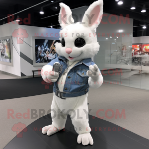 White Chinchilla mascot costume character dressed with a Skinny Jeans and Rings
