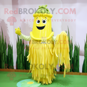 Yellow Celery mascot costume character dressed with a Pleated Skirt and Necklaces