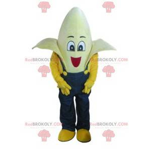 Mascote banana super engraçado com seu macacão azul -