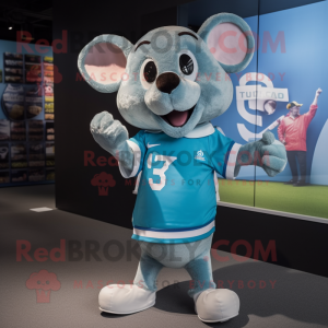 Cyan Mouse mascot costume character dressed with a Rugby Shirt and Shawl pins