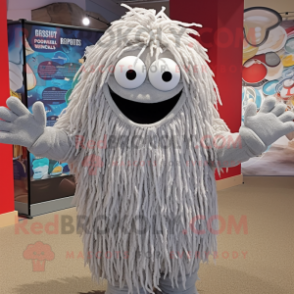 Silver Spaghetti mascot costume character dressed with a Bermuda Shorts and Mittens