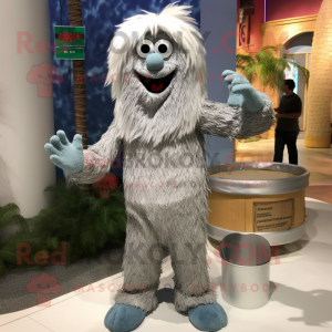 Silver Spaghetti mascot costume character dressed with a Bermuda Shorts and Mittens