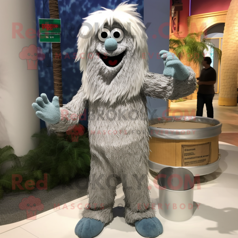 Silver Spaghetti mascot costume character dressed with a Bermuda Shorts and Mittens Silver Spaghetti mascot costume character dressed with a Bermuda Shorts and Mittens
