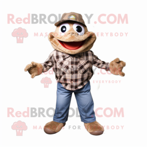 Brown Frog mascot costume character dressed with a Flannel Shirt and Hat pins