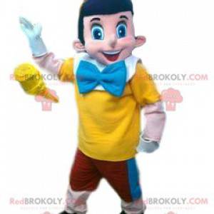 Maskot Pinocchio a jeho červené, žluté a modré oblečení -