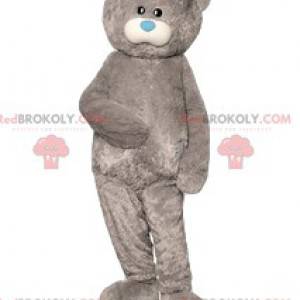 Mascotte d'ours gris et son petit museau bleu tout mignon -