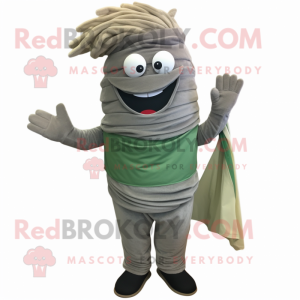 Gray Pesto Pasta mascot costume character dressed with a Corduroy Pants and Wraps