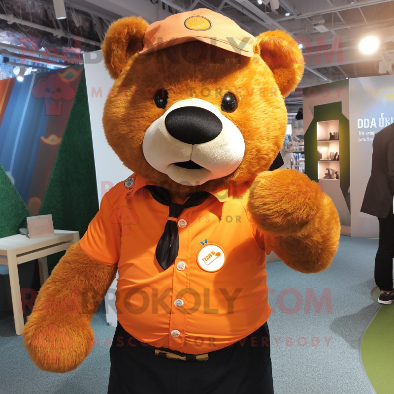 Orange Bear mascot costume character dressed with a Oxford Shirt and Lapel pins Orange Bear mascot costume character dressed with a Oxford Shirt and Lapel pins