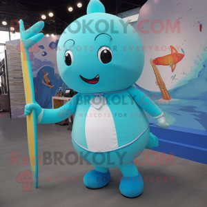 Turquoise Narwhal mascot costume character dressed with a Long Sleeve Tee and Cufflinks