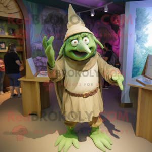 Olive Wizard mascot costume character dressed with a Bermuda Shorts and Cummerbunds