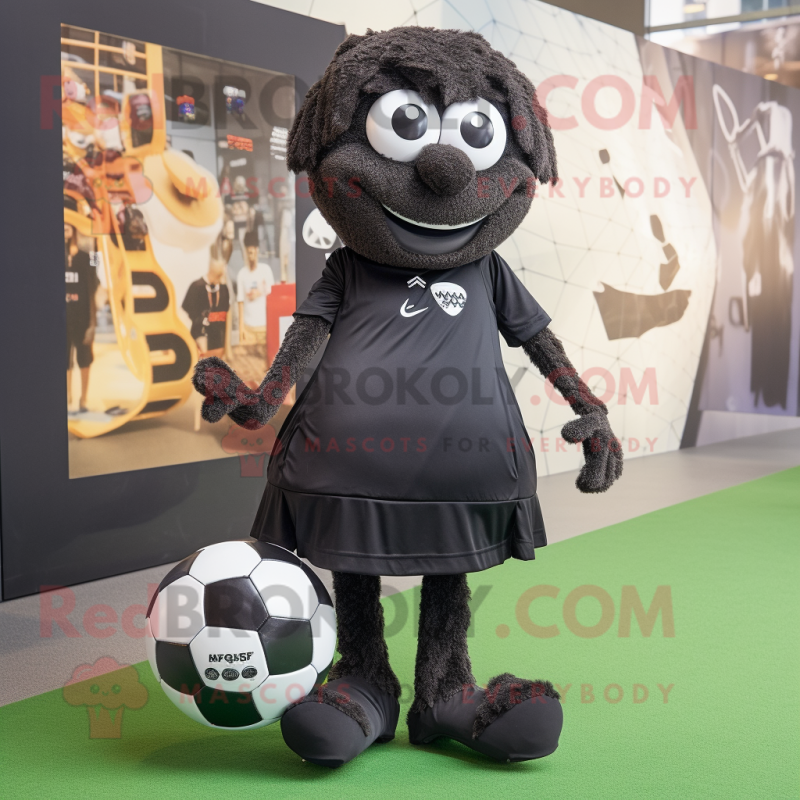 Black Soccer Ball mascot costume character dressed with a Wrap Skirt and Foot pads Black Soccer Ball mascot costume character dressed with a Wrap Skirt and Foot pads